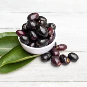 jamun_or_black_plum_in_a_bowl_with_leaves_isolated_on_white_wooden_background_with_copy_space_jpg_s_